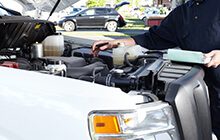 man working on a car